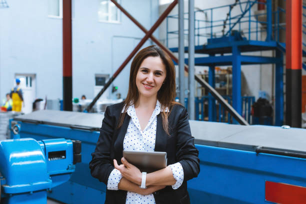istock Portrait of warehouse manager woman using tablet 1044782684