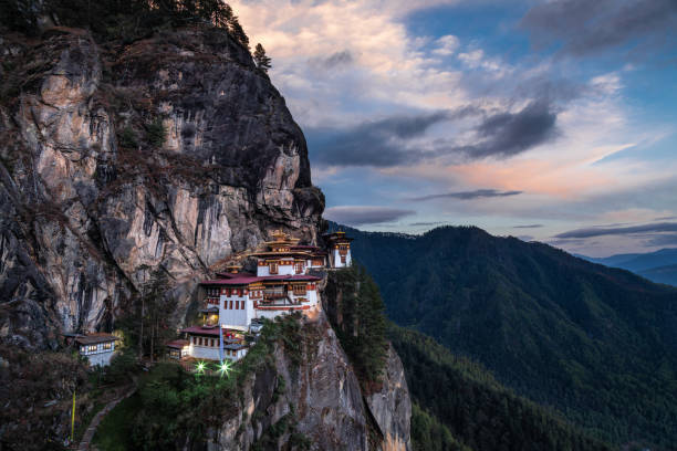 Tiger's nest monastery bhutan The famous Tiger's Nest monastery of Paro Taktsang at sunset in Bhutan taktsang monastery photos stock pictures, royalty-free photos & images