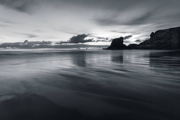 istock Twilight Reflections in monochrome, Porthcothan Beach, Cornwall 1044792180