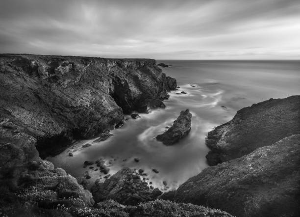 istock Rowan Cove in black and white, Porthcotham, Cornwall 1044792194