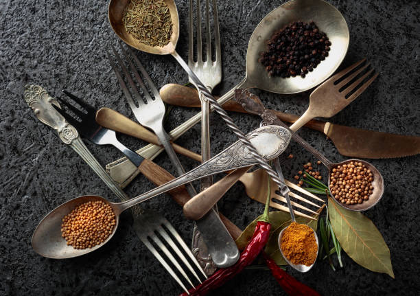 istock Various herbs and spices on metal table. 1044799580
