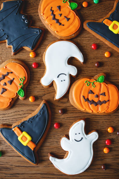 istock festive cookies for halloween with pumpkins on table 1044812418