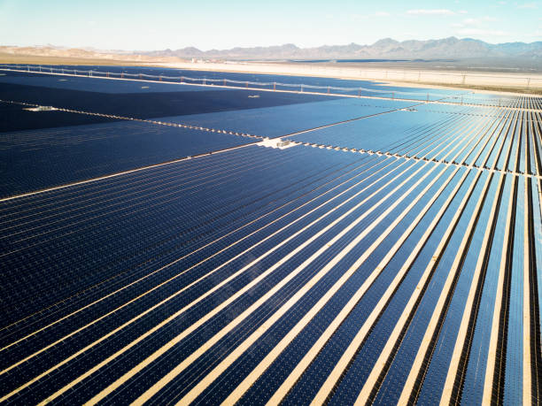 istock Aerial View of a Large Solar Panel Farm 1044816378