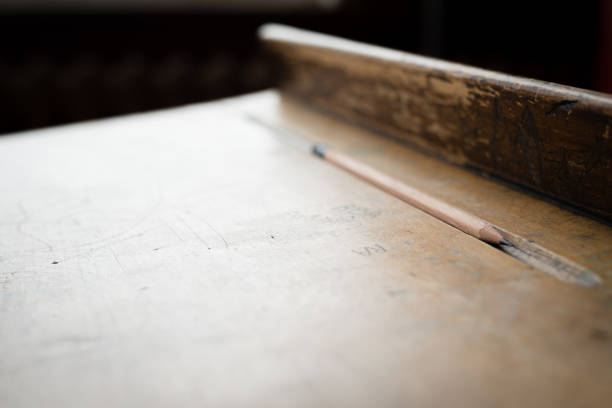 istock Old Fashioned Wooden School Desk with Pencil 1044820712