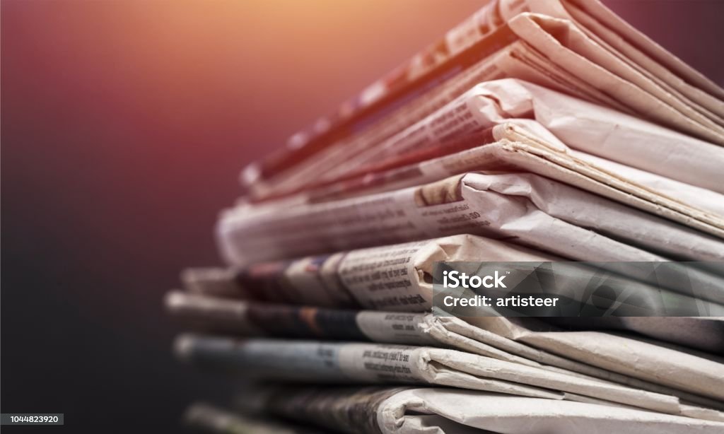 Journalism. Pile of newspapers on white background Newspaper Stock Photo