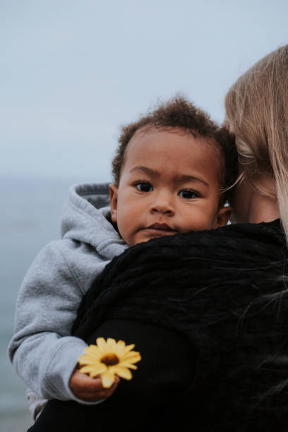 istock Mom with young son by the water 1044824372