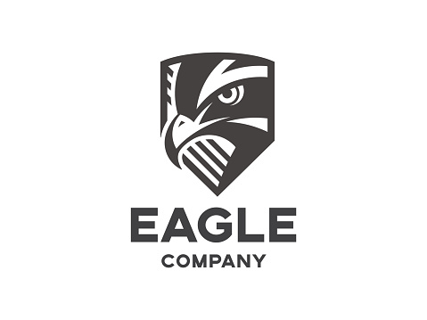 Head of the eagle on the shield - black illustration, mark, emblem on a white background