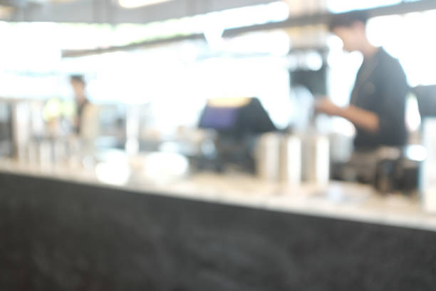 istock Blur cafe restaurant on indoor, use for background. modern cafe with counter coffee bar, For create montage product display in golden time 1044829540