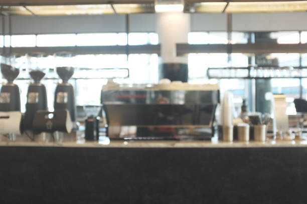 istock Blur cafe restaurant on indoor, use for background. modern cafe with counter coffee bar, For create montage product display in golden time 1044829576