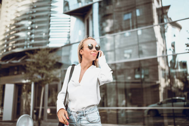 istock Cute Student Waiting For A Friend In Downtown 1044832748