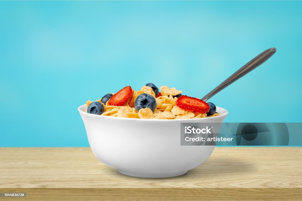 Cereal. Healthy Homemade Oatmeal with Berries for Breakfast Bowl Stock Photo