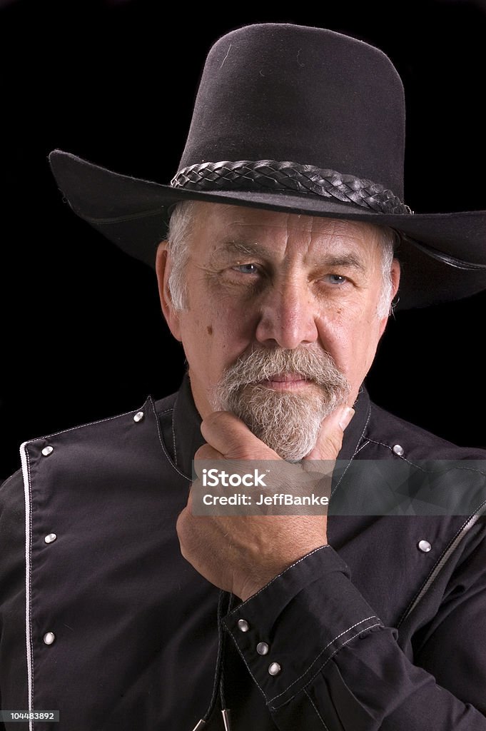 Vecchio Cowboy guardando come Buffalo Bill - Foto stock royalty-free di Pelle di vacca