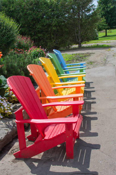 istock Garden chairs lined up along the sidewalk 1044846984