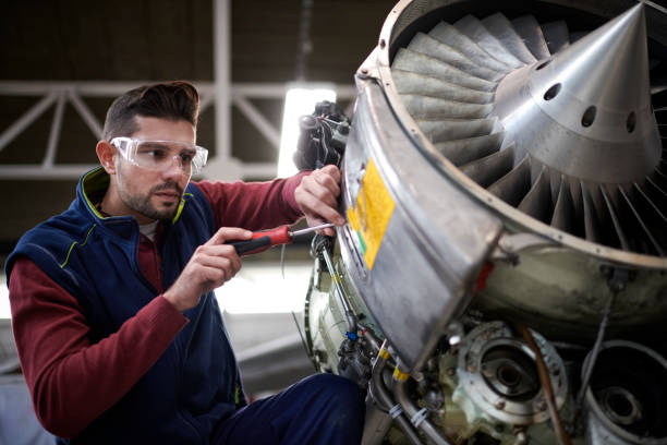 istock Aircraft mechanic in the hangar 1044847594