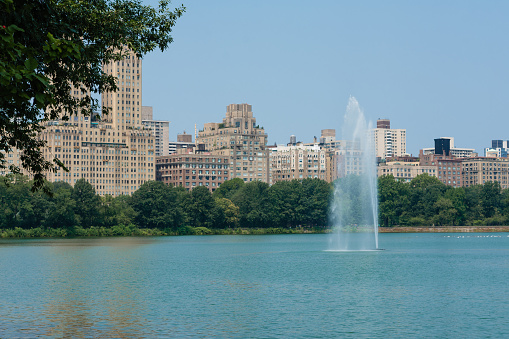 Panorama with a fountain, view of New York from the city park