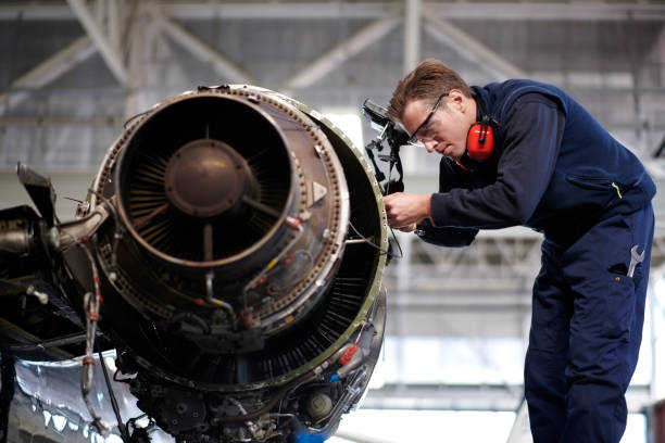 istock Aircraft mechanic in the hangar 1044850766