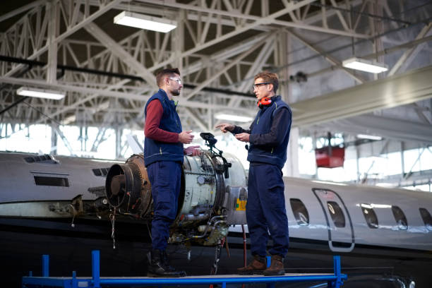 istock Aircraft mechanics in the hangar 1044850974