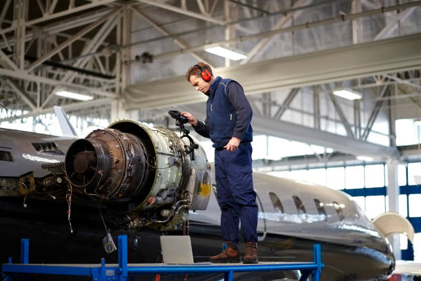 istock Aircraft mechanic in the hangar 1044851114