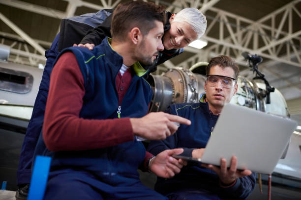 istock Aircraft mechanics in the hangar 1044851290