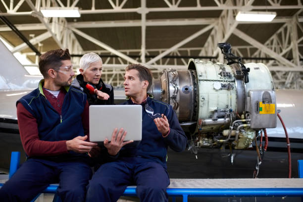 istock Aircraft mechanics in the hangar 1044851528