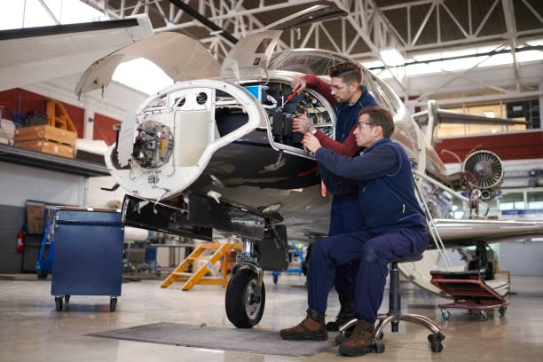 istock Aircraft mechanics in the hangar 1044851626