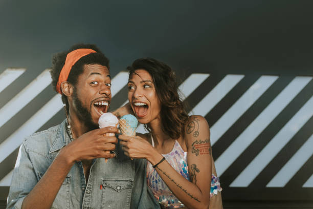 istock Cheerful couple enjoying ice cream 1044852304
