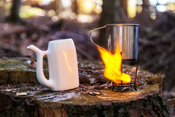istock Mug with mineral water heated on fire 1044852380