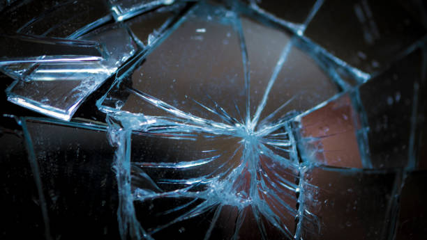 istock Pieces of splitted or broken glass 1044856224