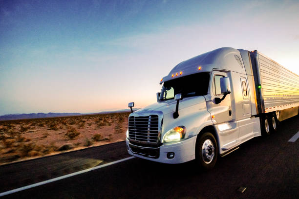 istock Long Haul Semi Truck Speeding Down Highway 1044859534