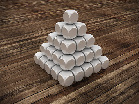 Pyramid of Blocks on Wood Floor - Wood Background - 3D Rendering