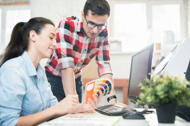 istock Coworking designers exploring colorful palette 1044866786