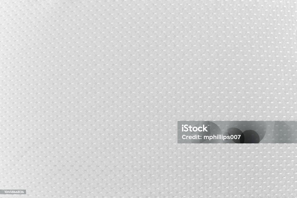 American Football Jersey Texture Background An American football jersey texture or background. Textured Stock Photo