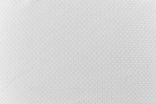 American Football Jersey Texture Background An American football jersey texture or background. sports jersey stock pictures, royalty-free photos & images