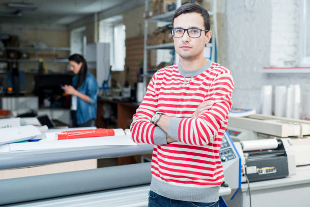 istock Young worker of typography office 1044866860