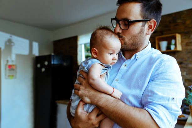 istock Father playing with his baby 1044870612