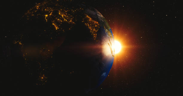 istock Rising sun behind planet earth 1044875914