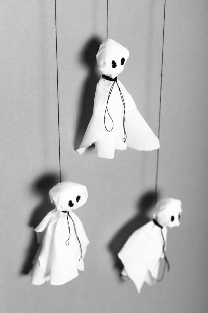 istock Paper ghosts art. Celebration Halloween craft concept 1044878950