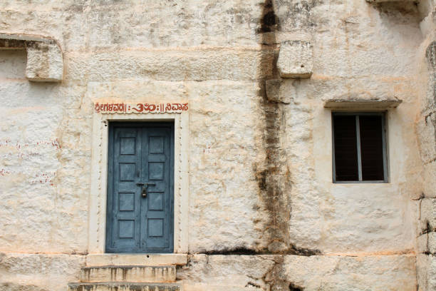 A rustic window and a door at an ashram complex in Hampi. Taken in India, August 2018.