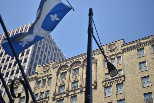 montreal buildings & quebec flag