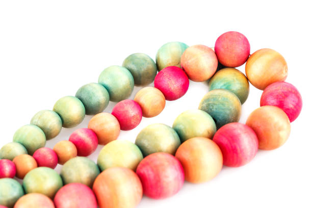 Necklaces with wooden beads isolated on white background.