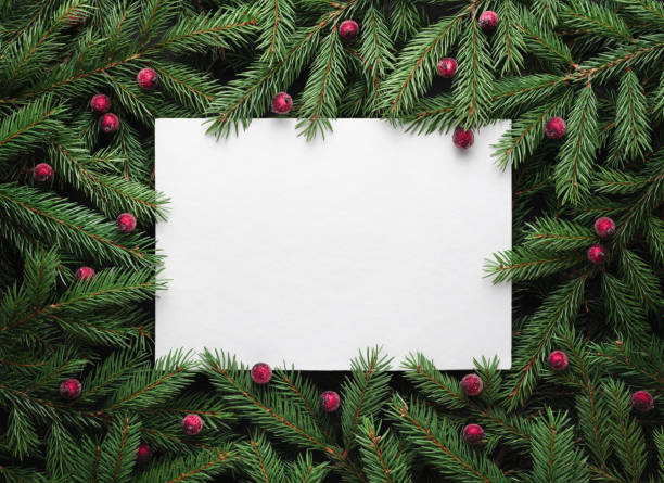 istock Christmas holidays background with paper sheet for festive text 1044904080