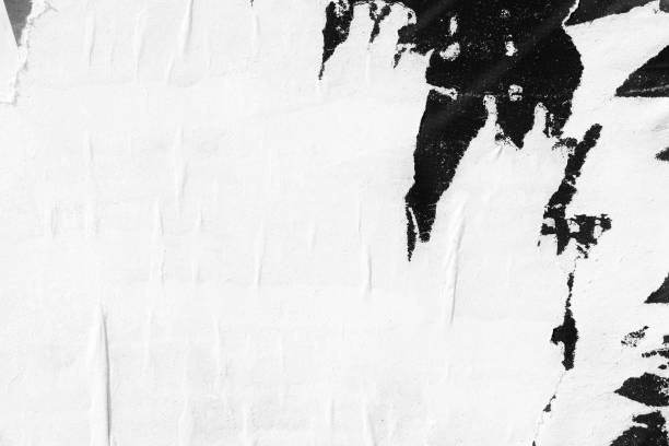 istock Blank white old ripped torn paper crumpled creased posters grunge textures backdrop backgrounds placard 1044908570