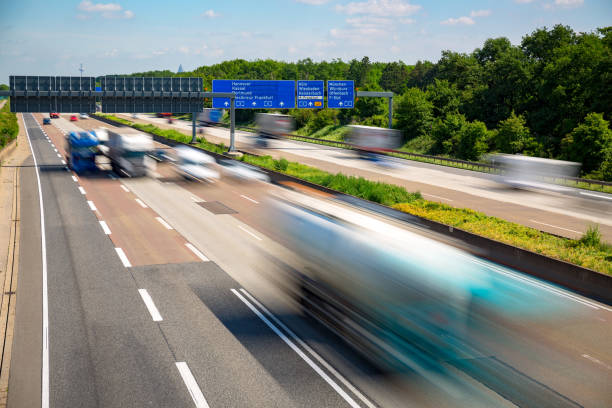 istock Autobahn highway with blurred trucks Frankfurt Germany 1044909054