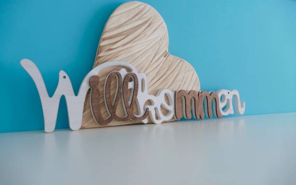 German word Willkommen, Welcome on blue background