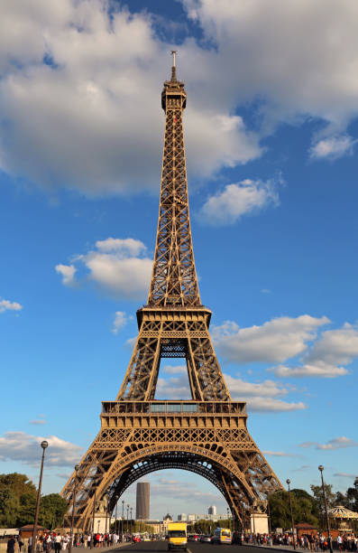 istock Very high Eiffel Tower and the blue sky with clouds 1044915778