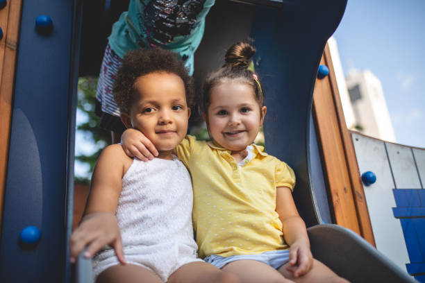 istock Best friends having fun together on a playground 1044929940