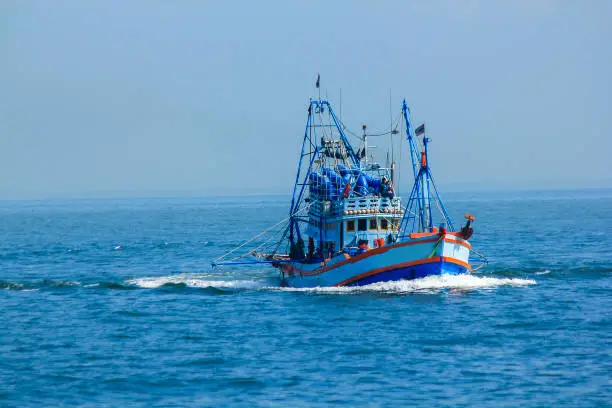 Photo of Large fishing boats in the sea.