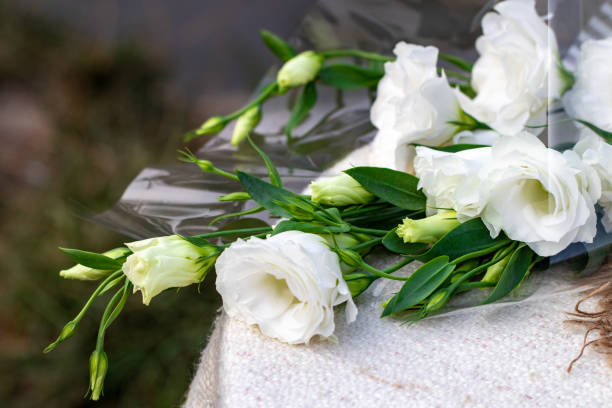 istock lisianthus white bouquet is on the table 1044934410