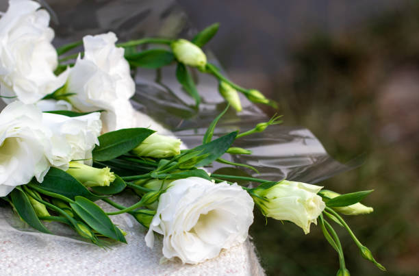 istock lisianthus white bouquet is on the table 1044934452