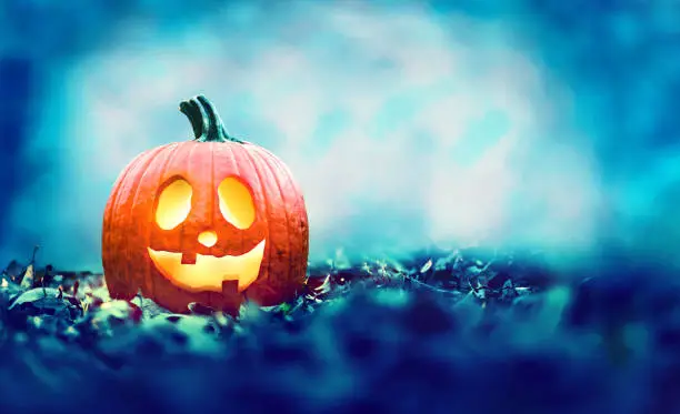 Photo of Halloween pumpkin at night